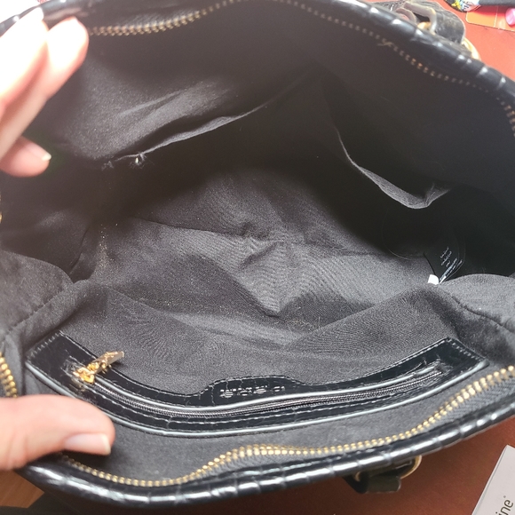 Bebe, Black Handbag. Handbag studs on bottom. Gold lettering. - Picture 3 of 4